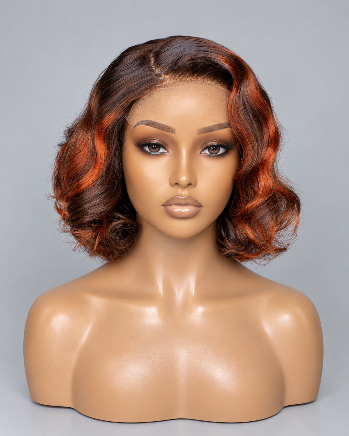 Wig Lix — 12″ with 5×7 closure. Brown and copper wave bob.