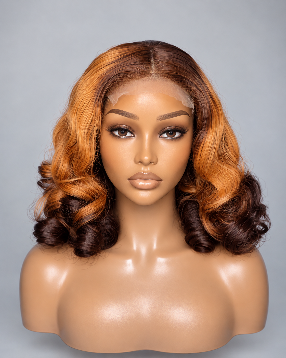 Wig Rosa — 18″ with 5×5 closure. Golden copper waves with dark brown ends.