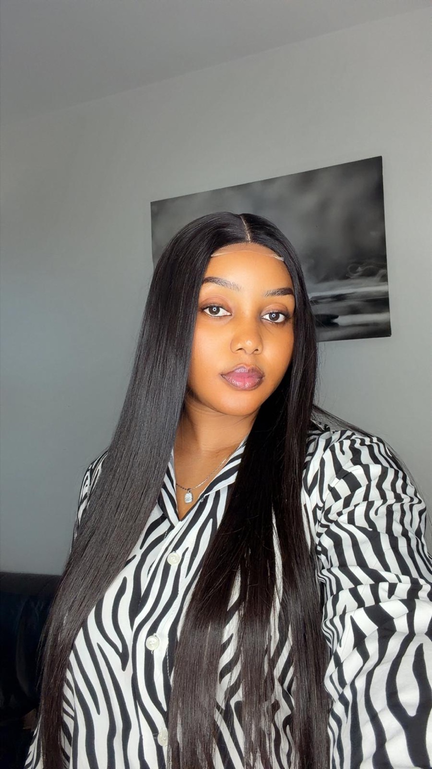 Bone Straight — 24″ with 2×4 closure. Long black bone straight hair.